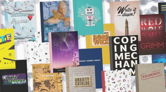 Collection of journal cover designs arranged in a haphazard overlapping way with confetti in the background